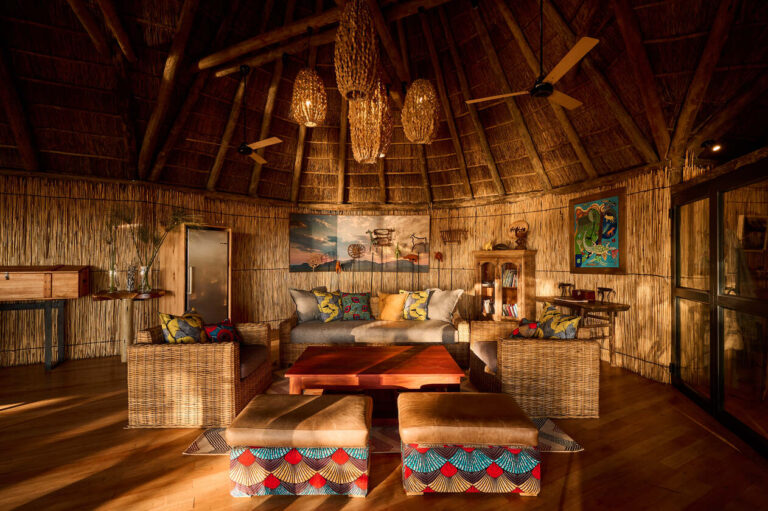 A cosy corner made of traditional reeds for relaxing in the main area of Nxamaseri Island Lodge