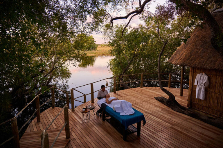 The massage deck overlooking the okvango waters at Nxamaseri Island Lodge