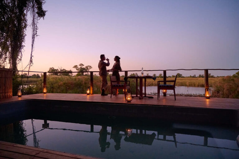 The swimming pool area overlookg the waters and makes a lovely private dinner area