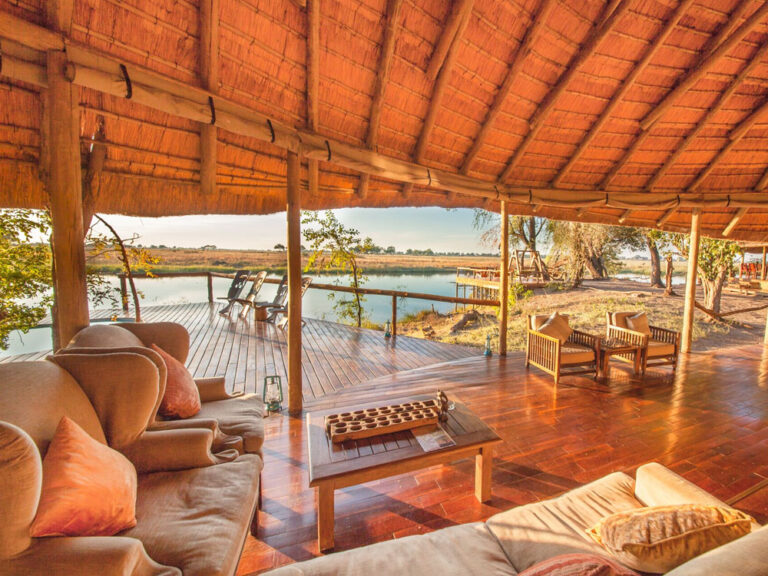 Wooden deck and swimming pool beside the lagoon at Lagoon Camp.