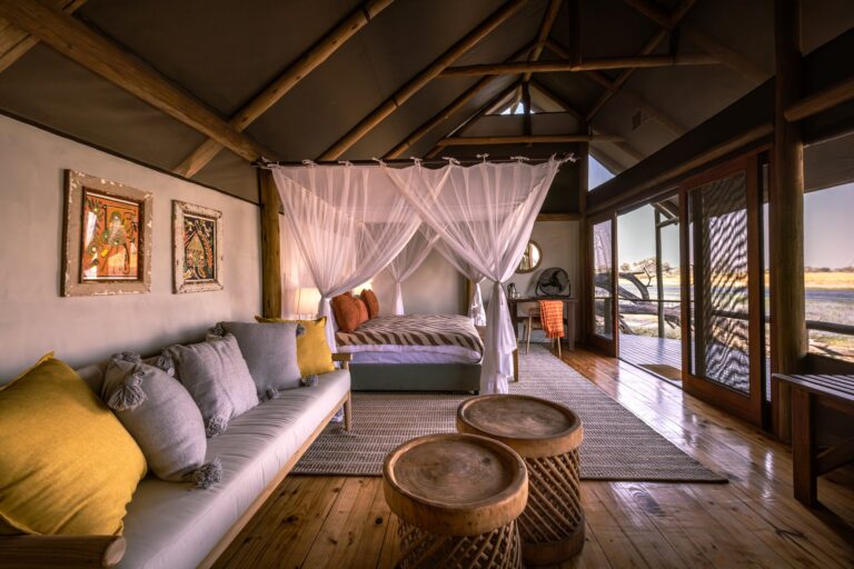 Large suite of Okavango Delta Safaris with lounge area and views on the the river.