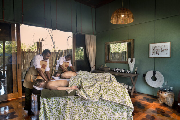 Guests receiving a massage in the spa at Atzaró Okavango Camp in Botswana.